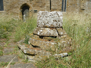 The base of a large stone cross