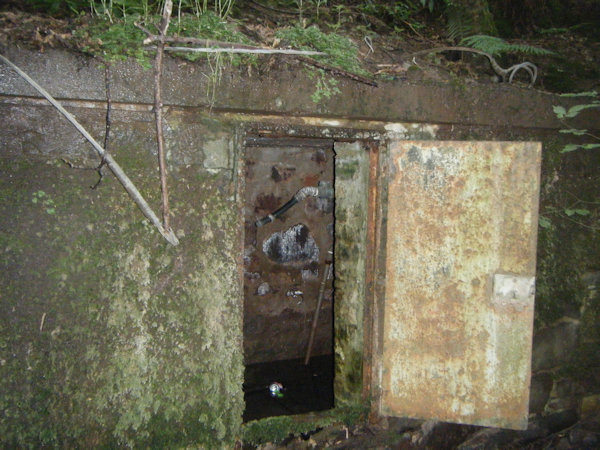 stone structure with metal pipes inside